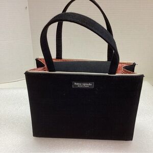 Kate Spade mini bag with handles. Red & White Gingham lining.